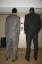 Businessmen Waiting for Elevator Royalty Free Stock Photo