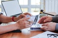 Businessmen who are stressed due to bankruptcy and are tearing the contract in front of the lawyer in the lawyer office Royalty Free Stock Photo