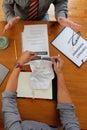 Businessmen who are stressed due to bankruptcy and are tearing the contract in front of the lawyer in the lawyer office Royalty Free Stock Photo