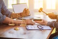 Businessmen who are stressed due to bankruptcy and are tearing the contract in front of the lawyer in the lawyer office Royalty Free Stock Photo