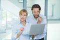 Businessmen working with laptop at office, discussing, copyspace, successful business Royalty Free Stock Photo