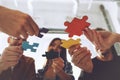 Teamwork of partners. Concept of integration and startup with puzzle pieces Royalty Free Stock Photo