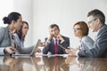 Businesspeople arguing in meeting Royalty Free Stock Photo