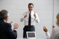 businesspeople clapping hands during a meeting Royalty Free Stock Photo