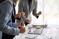 Businesspeople clenching their fists in the meeting to cheer up. Unity, Trust, Victory Royalty Free Stock Photo