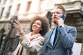 Businesspeople commuting and walking in busy city Royalty Free Stock Photo