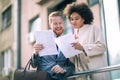 Businesspeople commuting and walking in busy city Royalty Free Stock Photo