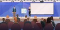 Businesspeople couple tribune speech business people making financial presentation on conference meeting with flip chart