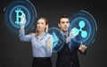 Businesspeople with cryptocurrency holograms