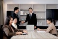 Businesspeople discussing at conference office desk, manager leader shaking hands at group board meeting. businessman reached Royalty Free Stock Photo