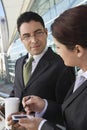 Businesspeople Discussing Outside Office Royalty Free Stock Photo