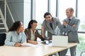 Businesspeople discussing together in conference room during meeting at office Royalty Free Stock Photo