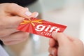 Person Hand Giving Gift Card To Another Person Royalty Free Stock Photo