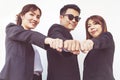 Businesspeople hands in fists, business and teamwork concept