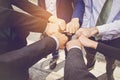 Businesspeople hands in fists in circle, business and teamwork c