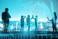 Businesspeople with hi-five gesture standing on night city background with glowing globe and business chart hologram. Success, Royalty Free Stock Photo