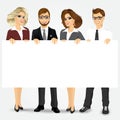 Businesspeople holding a blank billboard Royalty Free Stock Photo