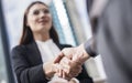 Businesspeople making hand shake in the city