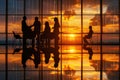 businesspeople in a modern office, silhouetted against a sunset window. Reflective floor. Serious atmosphere, indicating