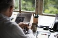 Businesspeople Reading Newspaper at Office Updating News Royalty Free Stock Photo