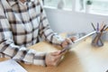 Businesspeople relaxing using digital tablet computer work study while sitting on chair in office Royalty Free Stock Photo