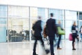 Businesspeople Rushing through Corridor, Motion Blur Royalty Free Stock Photo