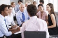 Businesspeople Seated In Circle At Company Seminar Royalty Free Stock Photo