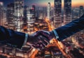 Businesspeople shaking hand with skyscraper at night in the background. Teamwork and deal concept Royalty Free Stock Photo