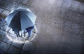 Businesspeople Sheltering Under One Umbrella In Rain Royalty Free Stock Photo