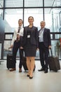 Businesspeople standing together with luggage Royalty Free Stock Photo