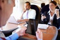 Businesspeople On Train Using Digital Devices Royalty Free Stock Photo