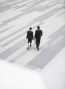 Businesspeople Walking In Outdoor Plaza Royalty Free Stock Photo