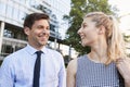 Businesspeople Walking Past Modern City Offices On Way To Work Royalty Free Stock Photo