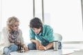 Businesspeople working at creative office lobby Royalty Free Stock Photo