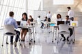 Businesspeople Working At Desks In Modern Office Royalty Free Stock Photo