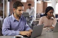 Businesspeople Working On Laptops In Office Coffee Bar Royalty Free Stock Photo