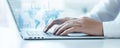 Businessperson analyzes data on global map displayed on laptop screen. Tech expert uses predictive big data models to uncover