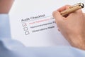 Businessperson Filling Audit Checklist Form Royalty Free Stock Photo