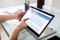 Businessperson Filling Online Survey Form On Digital Laptop Royalty Free Stock Photo
