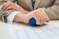 Businessperson hand with stressball