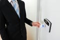 Businessperson Hands Holding Keycard