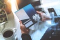 Businessperson Hands holding New Gift Card or Credit card,digital tablet computer dock keyboard,smart phone on marble