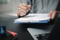 Businessperson signing contract, partnership agreement and Lawyer, broker or HR manager executive manager hand filling paper. Royalty Free Stock Photo