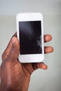 Businessperson smartphone with cracked screen