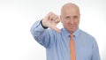 Businessperson Smile and Make Dislike Hand Gestures Royalty Free Stock Photo