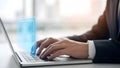 Businessperson typing on laptop with digital interface computer keyboard hands. Royalty Free Stock Photo
