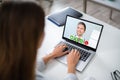 Businessperson Videochatting With Doctor On Laptop Royalty Free Stock Photo