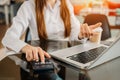 Businesswoman or accountant hand typing laptop working to calculate on desk about cost at home office