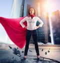 Businesswoman acts like a super hero. Concept of success and determination