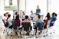 Businesswoman Addressing Multi-Cultural Office Staff Meeting Royalty Free Stock Photo